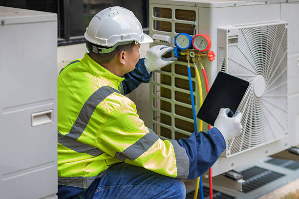 Professional Hvac technician working in Groveland, MA